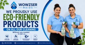 holding eco-friendly cleaning bottle.